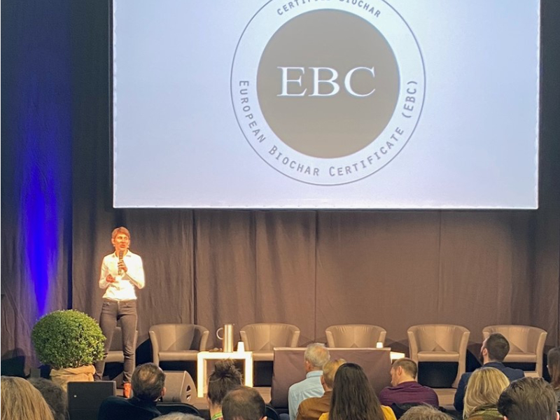 Women-speaking-in-front-of-ebc-logo