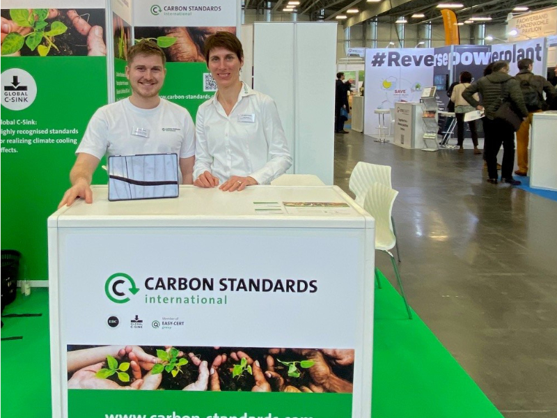 employees-in-front-of-exibition-boot